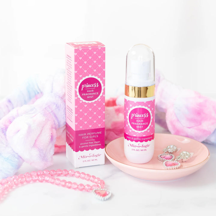 Pink bottle and box of Hair Fragrance Mist. Lightweight; keeps hair fresh. Available in 50ml and 100ml sizes.