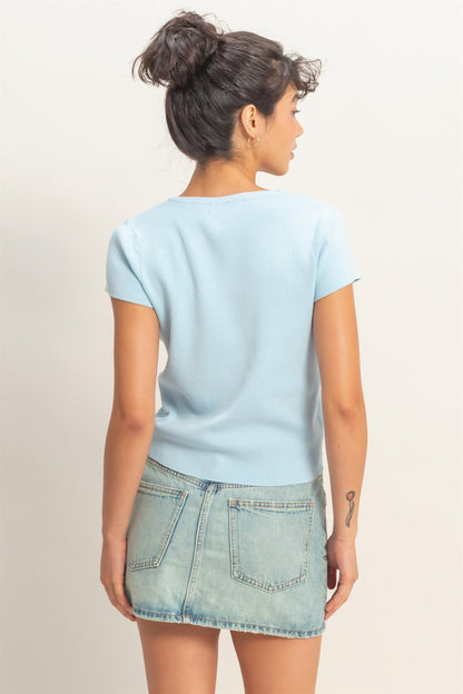 Light blue Button Front Short Sleeve Knit Top, available in sizes XS-XL.