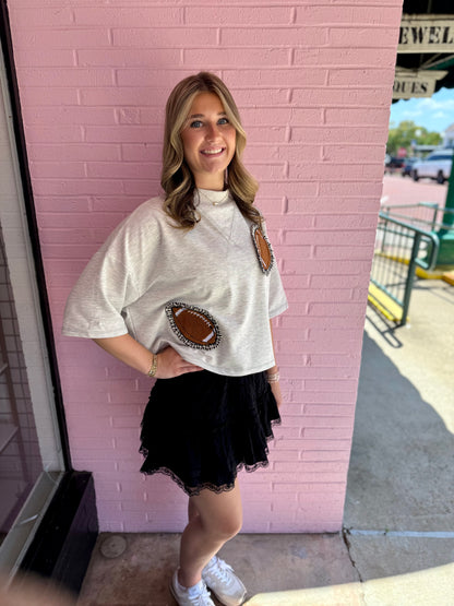 Gameday Gingham Football Patch Top, available in sizes S-XL.