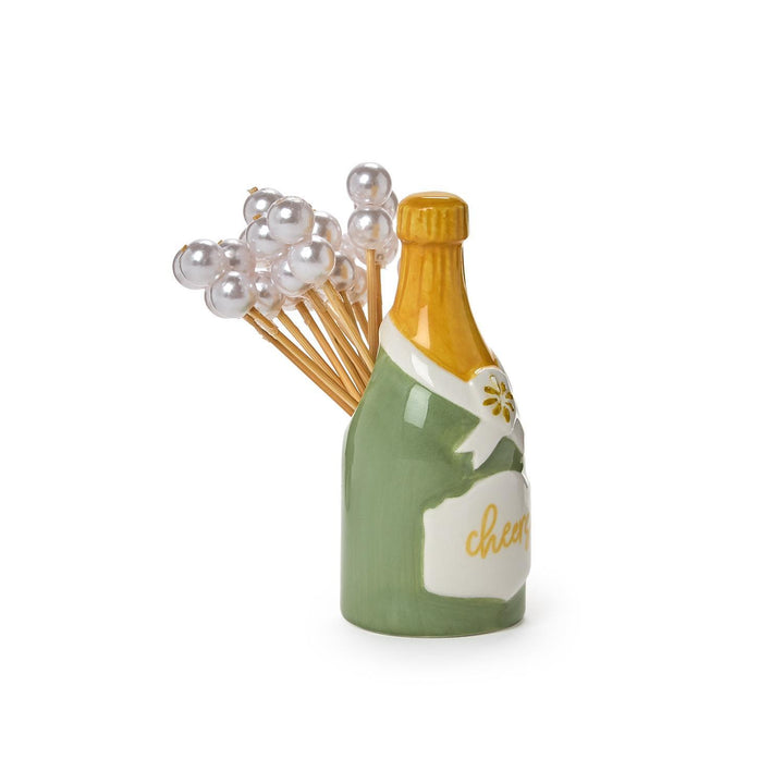 Champagne bottle pick holder with twenty pearl cocktail picks.