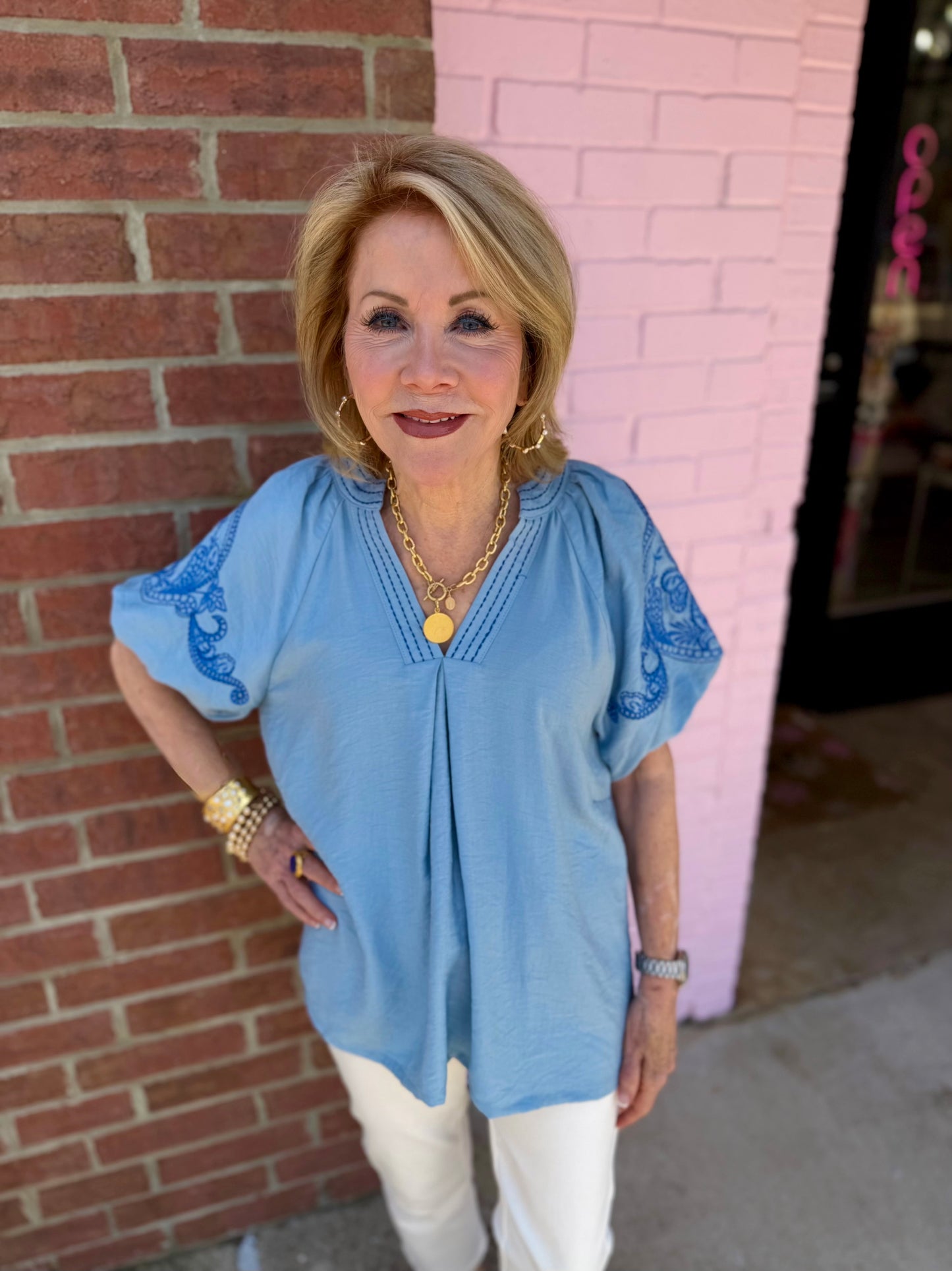 Light Blue Embroidered Puff Sleeve Top, available in sizes XS-XL.