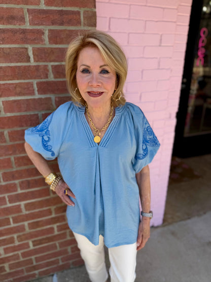 Light Blue Embroidered Puff Sleeve Top, available in sizes XS-XL.