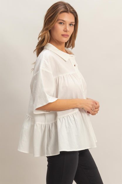 Button-Front Tiered Top: loose cotton blouse, short sleeves, ruffled hem. Available in sizes XS–XXL.