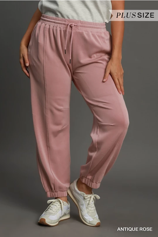 Plus-size Ultra Soft Jogger Pants in antique rose pink with drawstring waist. Available in sizes 1X–4X.