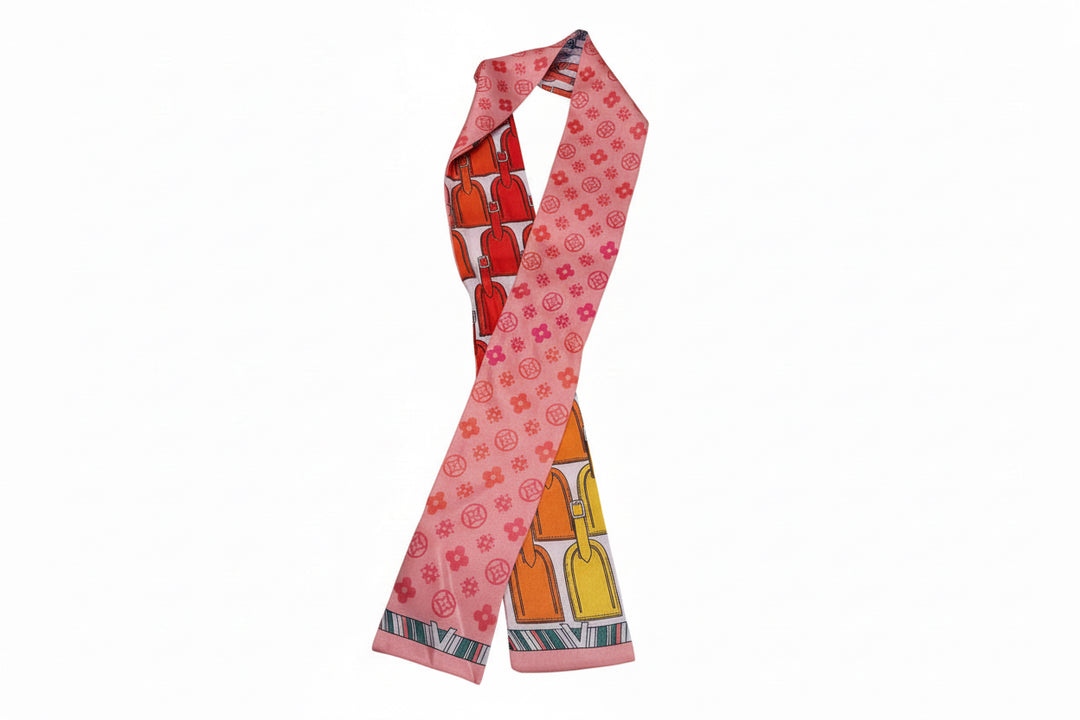 Pink silk Twilly Scarf with orange, yellow, red locks and small circles. Available sizes: 32"x2".