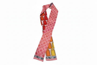 Pink silk Twilly Scarf with orange, yellow, red locks and small circles. Available sizes: 32"x2".