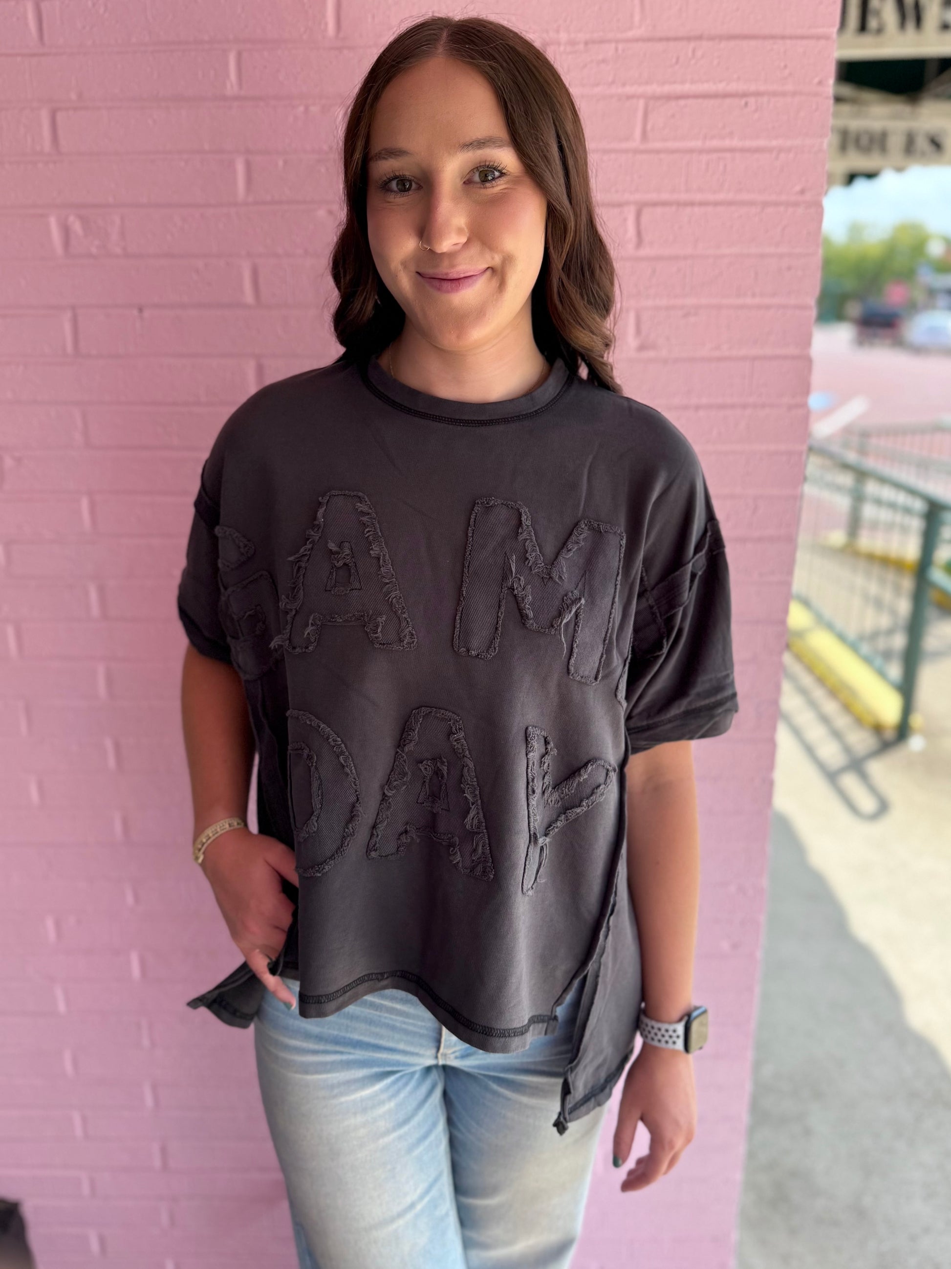 Black Dye & Wash Gameday Terry Top made from soft French terry fabric, available in sizes XS–XL.