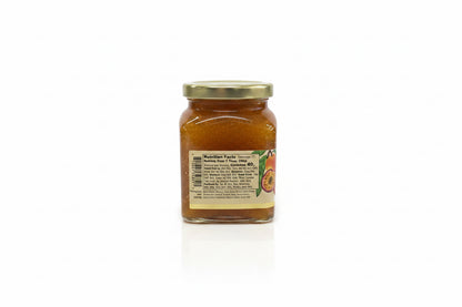 Reserve Mango Passionfruit Habanero Jam in a glass jar with a gold lid, featuring a label with nutrition facts, ingredients, and a passion fruit image. Available in 8 oz and 16 oz sizes.
