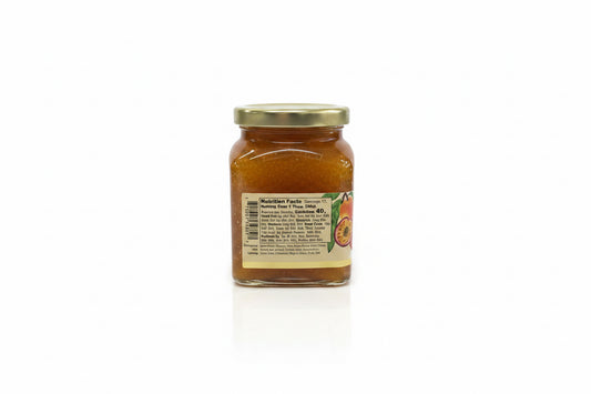 Reserve Mango Passionfruit Habanero Jam in a glass jar with a gold lid, featuring a label with nutrition facts, ingredients, and a passion fruit image. Available in 8 oz and 16 oz sizes.