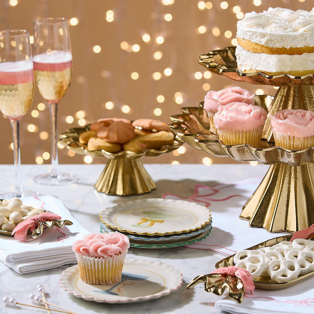 Stack of small, round, scalloped-edge Cheers Tidbit Plate | 4 Styles with a central ribbon illustration.