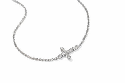 The Cross Crystal Delicate Bracelet has a sideways cross pendant with round clear crystals; available in multiple sizes.