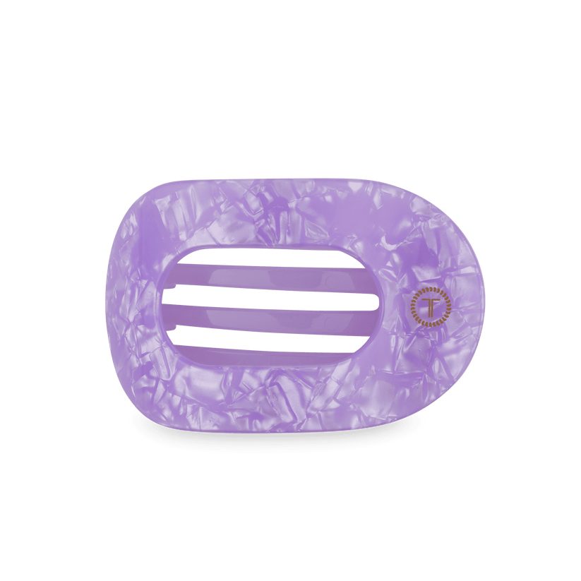 Classic Lavender Mist TELETIES hair claw in marbled purple acetate with gold T logo; available in small and large sizes.