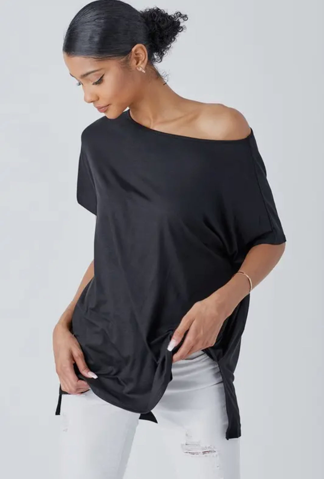 The Perfect Shirt: black rayon blend, comfortable fit, off the shoulder. Available sizes: XS-XL.