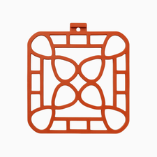 Orange, heat-resistant trivet with open-work flower design and top loop. Available in multiple sizes.