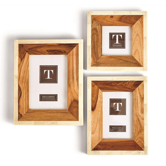 Set of three wood & bone photo frames with polished borders and light edges. Available in vertical and horizontal sizes.