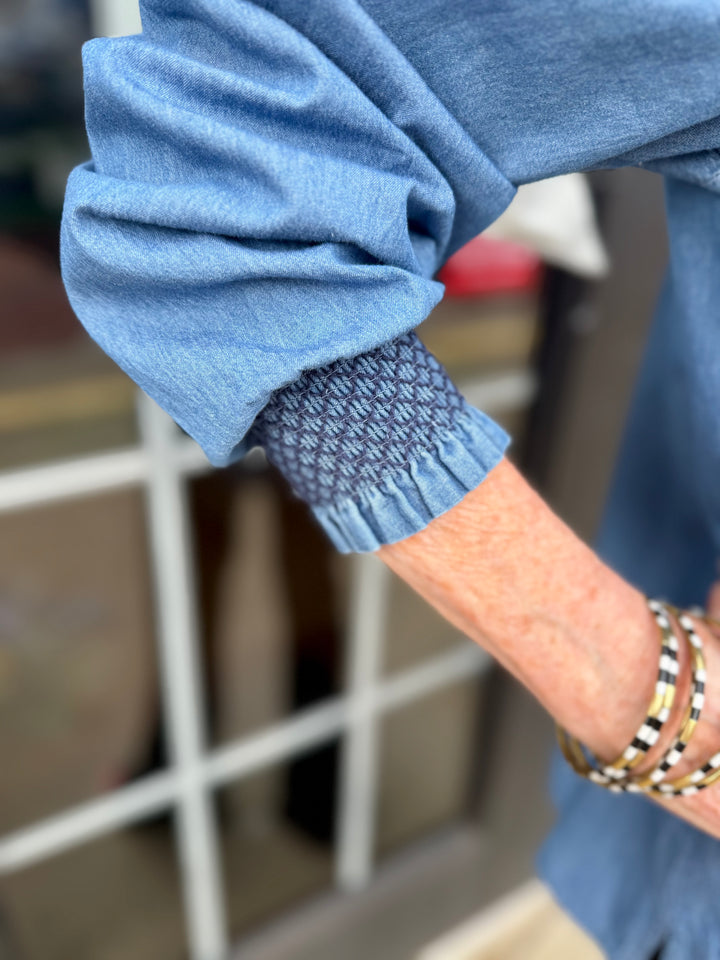 Kimberly Chambray Top with patterned cuff, available in sizes XS–XL.