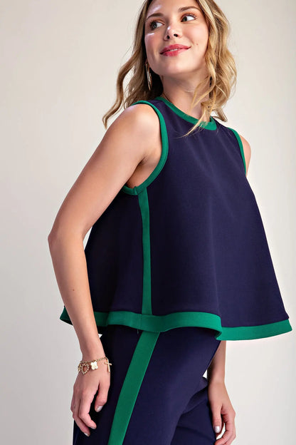 Contrast Swing Knit Pullover Top: sleeveless, navy blue with green trim, minimalist style. Available in sizes XS–XL.