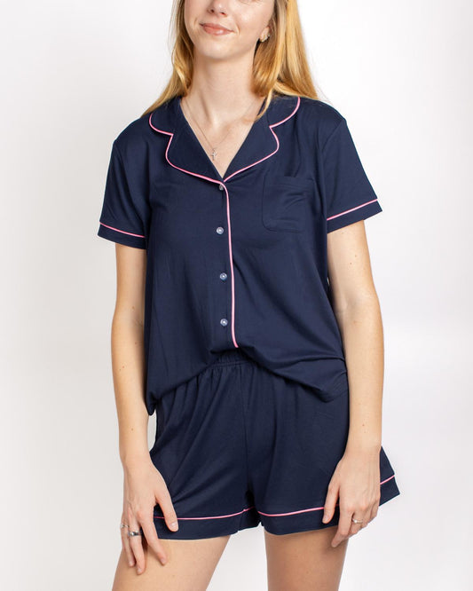 Elizabeth Short Sleeve Button Up Sleep Shirt pajama set in navy with pink piping, top and elastic-waist shorts. Sizes XS-XL.