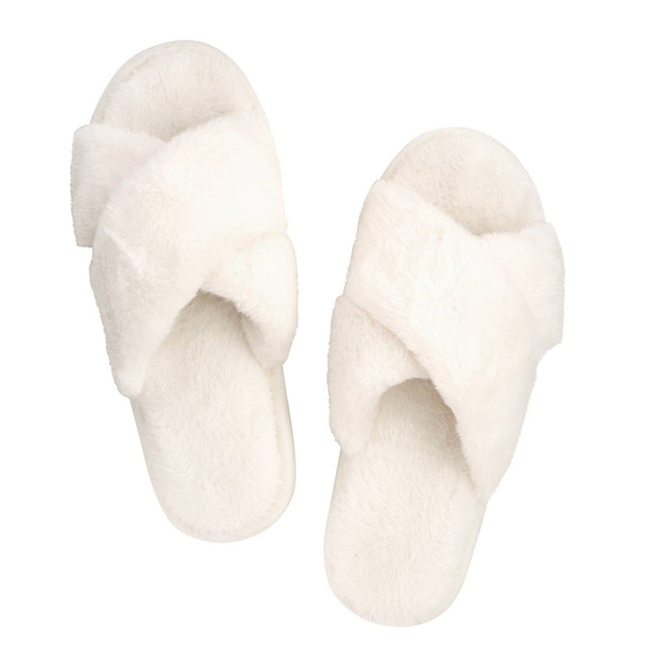 Ivory Criss-Cross Plush Slippers with wide, fluffy straps. Available in sizes S, M, L, and XL.