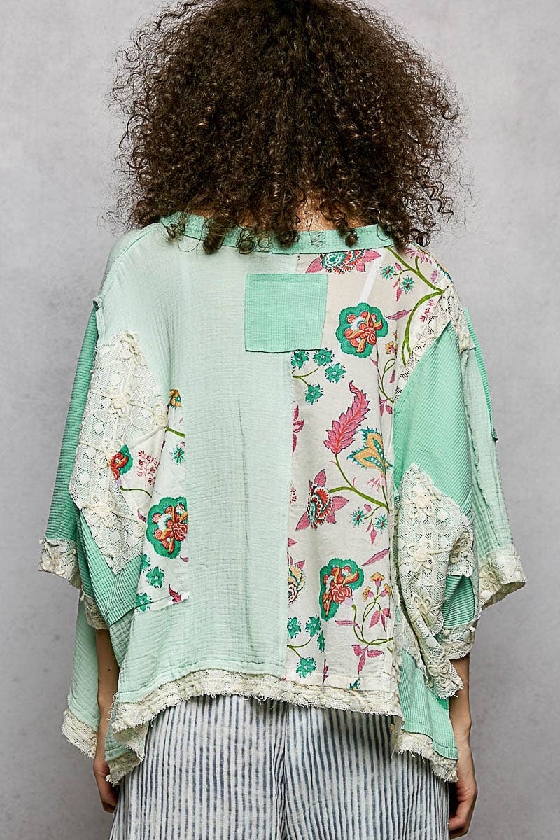 Round Neck Double Gauze Floral Woven Top in mint green with lace and floral panels. Available in sizes XS-XL.