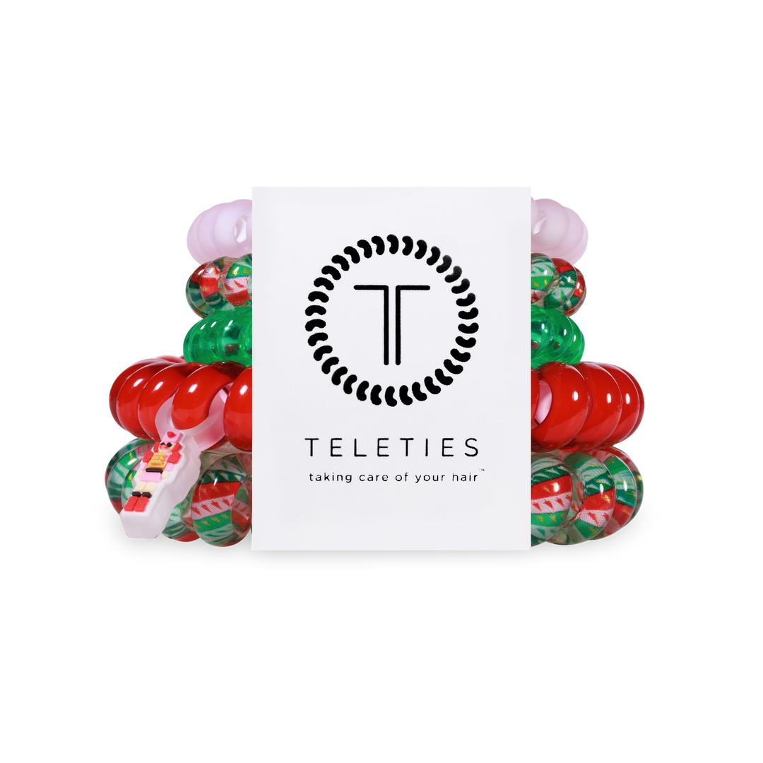 Spiral Hair Coils Mix Pack: red, green, white holiday designs. Strong grip, no-rip hold. Available in small and large sizes.