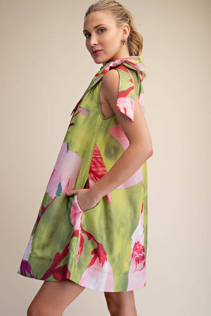 Royal/L Mini Dress with ruffle neck tie and sleeveless floral print. Available sizes: L.