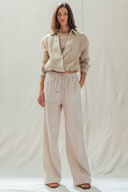 Natural Linen Blend Wide Leg Drawstring Pants, available in sizes XS-XL. Relaxed fit, lightweight fabric, ideal for warm weather.