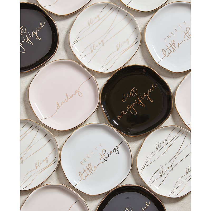 Ceramic trinket tray with gold edges, "darling" in cursive. Available in black, white, pale pink. Size options listed.