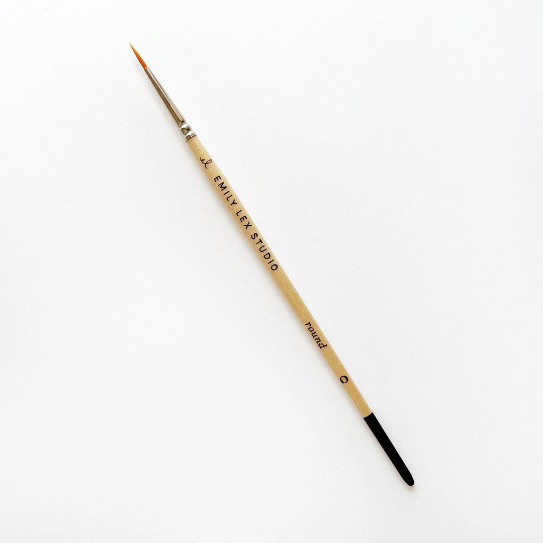 Watercolor Paintbrush Size 4: synthetic taklon bristles, thin round shape, beige handle, black-tipped end. Available in Size 4.