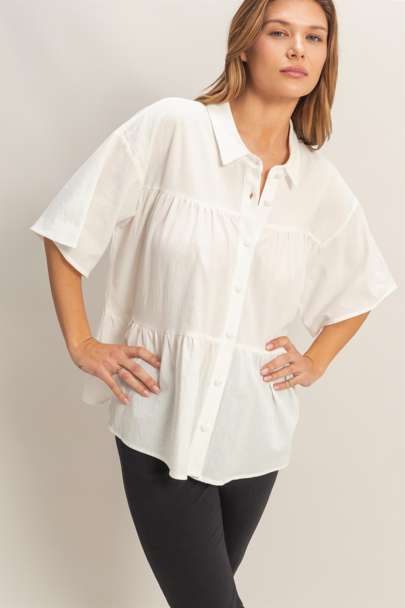 Button-Front Tiered Top: loose-fit, short sleeves. Available in sizes XS-XXL.