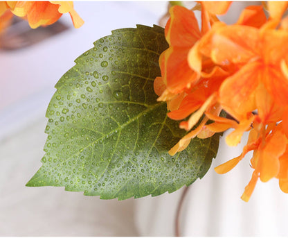 12.5" Real Touch lifelike Hydrangea in soft pink with 6" bloom, detailed with water droplets. Available in 12.5" size.