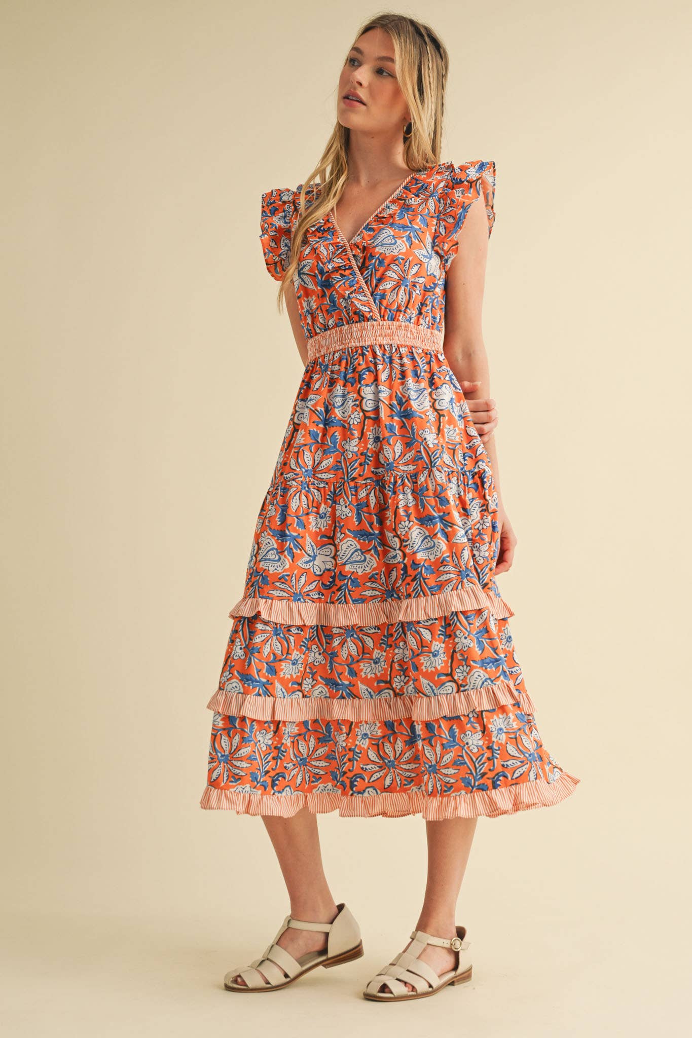 Mixed Floral Print Ruffle Trim Midi Dress with flutter sleeves, smocked waistband. Available in sizes XS–XL.