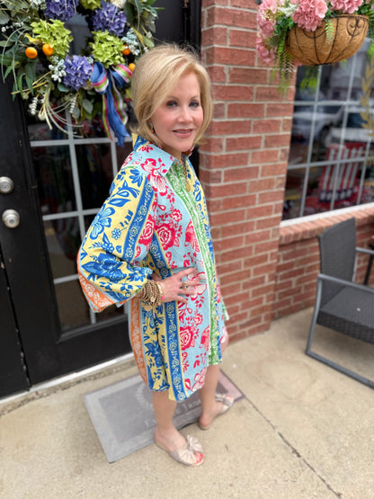 On Vacation Time Dress in colorful botanical print, available in sizes XS-XL.