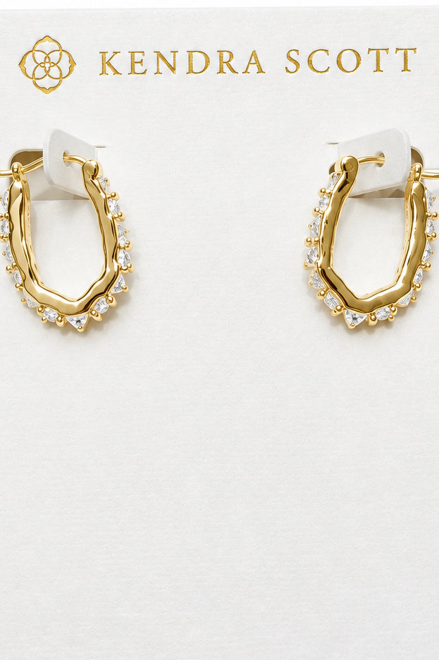 Fate Huggie White CZ Gold Earrings featuring cubic zirconia stones; available in multiple sizes.