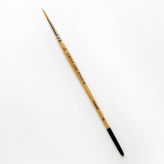 Watercolor Paintbrush: Size 2, wooden handle labeled "EMILY LEK STUDIO," metal ferrule, fine synthetic taklon bristles.