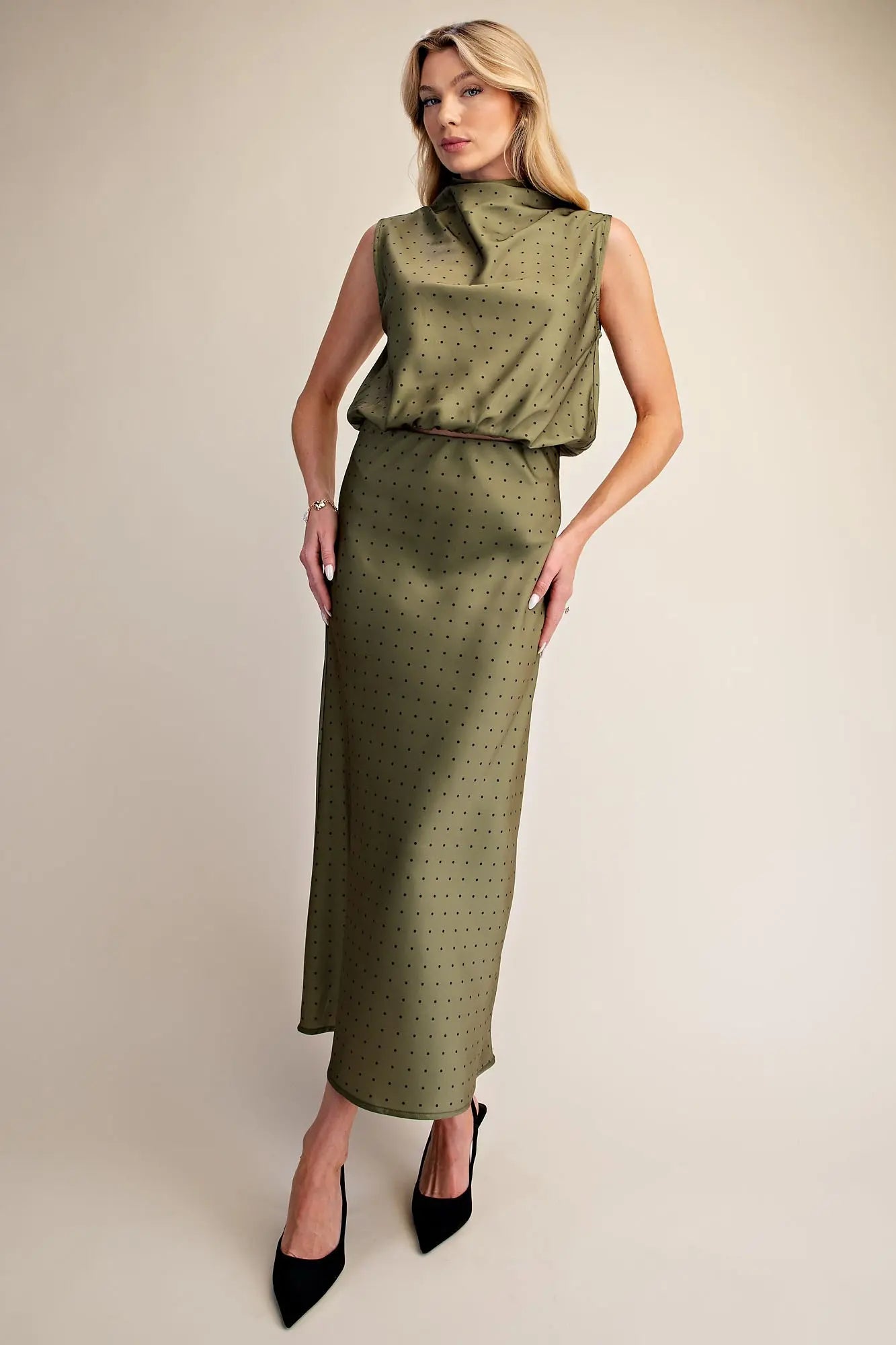 Polka Dot Satin Skirt in olive green with small black polka dots; available in sizes XS–XL.