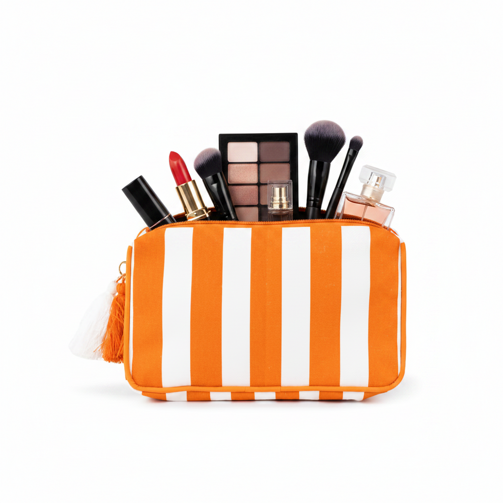 Burnt orange and white Megan Stripe Cosmetic Bag, laminated canvas, available in small, medium, and large sizes.