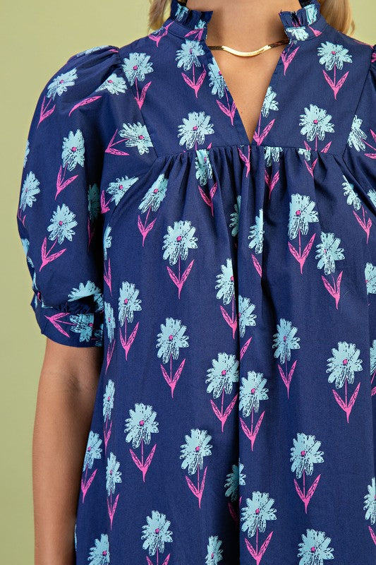 Midnight Floral Print Mini Dress: navy blue cotton, puffy sleeves, blue floral with pink stems, gathered chest. Sizes XS-XL.