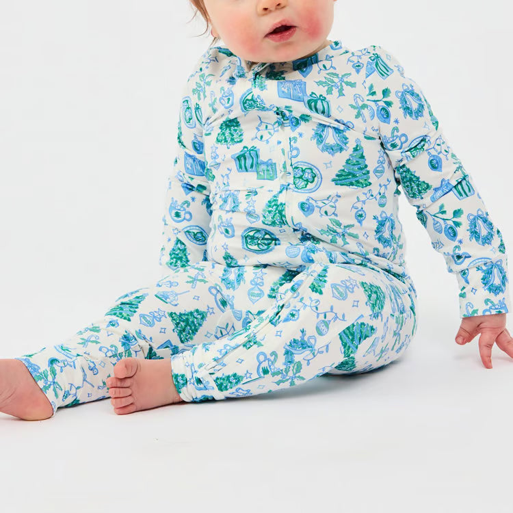 Baby Whimsey Wishes PJ Onesie, long-sleeve, footless, blue and green holiday print of ornaments, gifts, and trees. Available in various sizes.