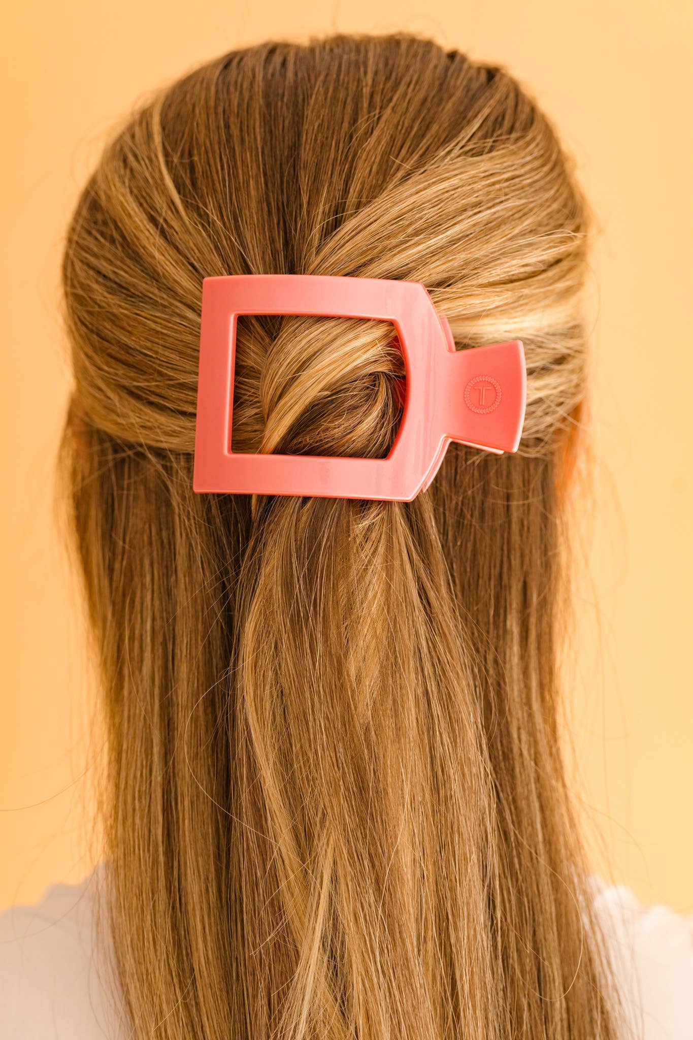 Pink TELETIES Square Flat Hair Clip; secures hair with style. Available sizes: Small, Large.