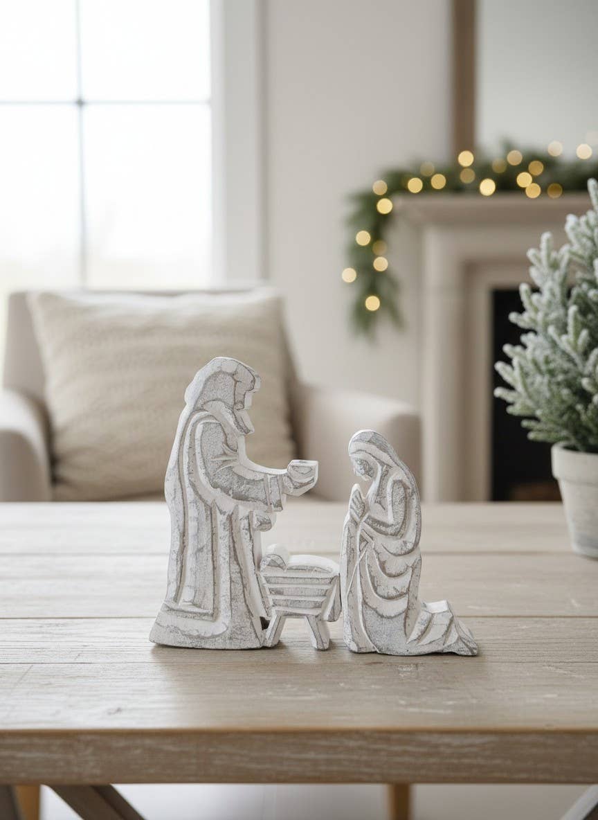 Nativity Trio figurine, 6.5x8in, features Mary, Joseph, and baby Jesus in a white finish.