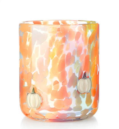 Heirloom Pumpkin Icon Candle, 12oz size, soy wax in a glass tumbler with iridescent orange, pink, and white speckles and two small raised white pumpkins; pumpkin custard scent.