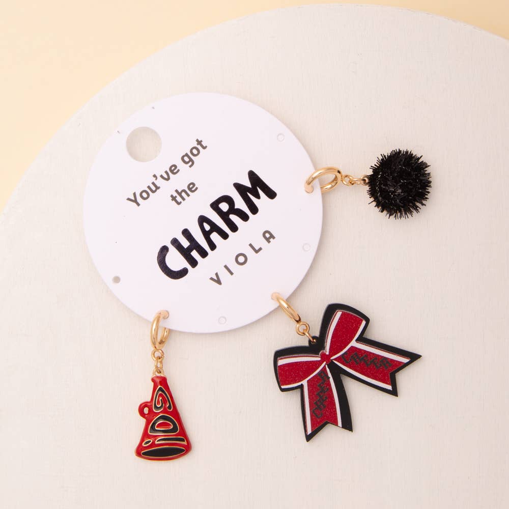Charm Set: red megaphone, black pom-pom, glittered red/black bow. Sizes: small/medium/large.