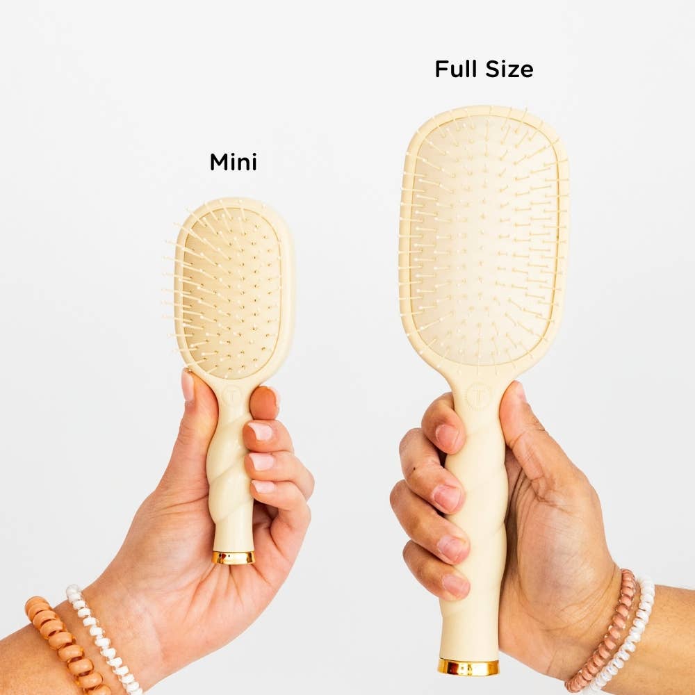 Mini Detangler Brush for Medium Hair | Tan—cream with gold accents; available in mini and full sizes.