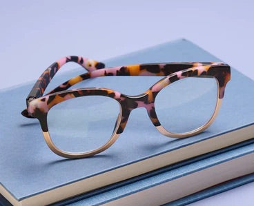 Peepers "Georgia" eyeglasses feature a soft square frame in tortoiseshell-patterned pink and brown earthy tones. Available in various sizes.