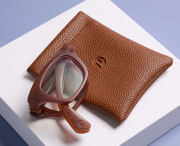 Peepers Twofold folding reading glasses in brown with UV400 protection, available in multiple sizes.