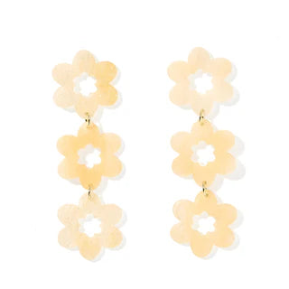The Zoey Statement Earrings: three linked pale yellow translucent flower shapes, hypoallergenic. Available in one size.