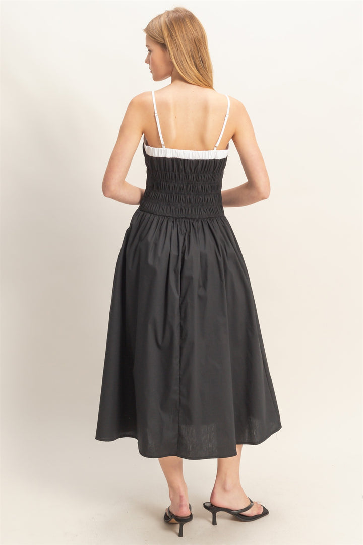 Smocked Strapped Midi Dress with smocked bodice and thin straps; available in sizes XS-XL.