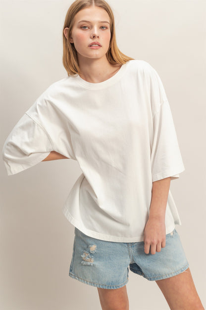 Washed Oversized Crew Neck Top. Available in sizes XS-XL.