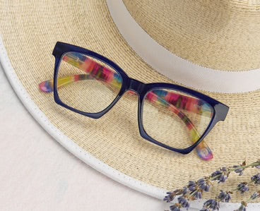 The Peepers - Maisie glasses: bold dark square frames, colorful temples. Available in small, medium, and large sizes.